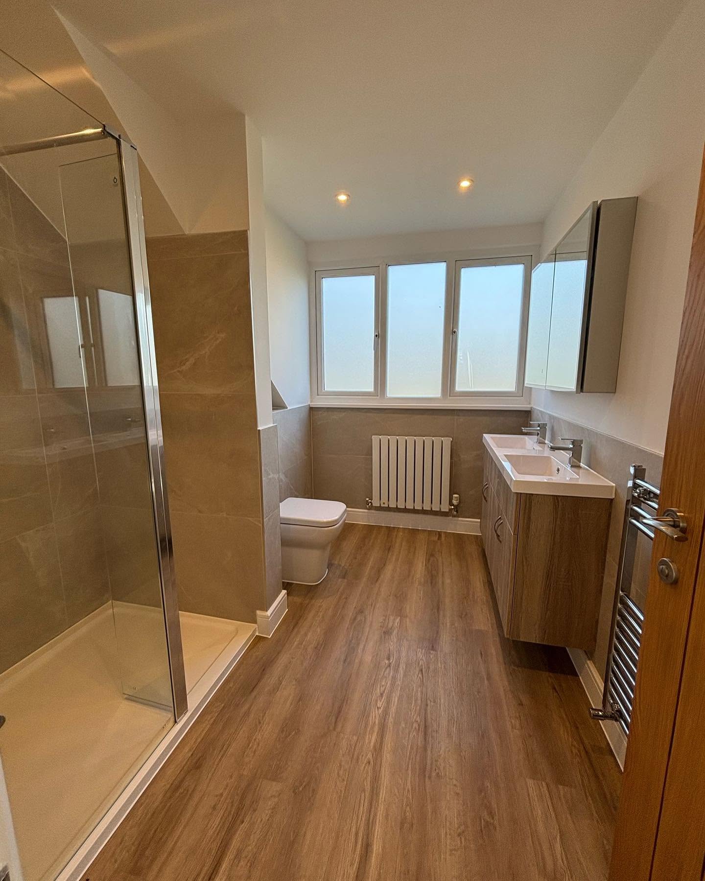 Completed Astwood Bank bathroom and designer radiator project