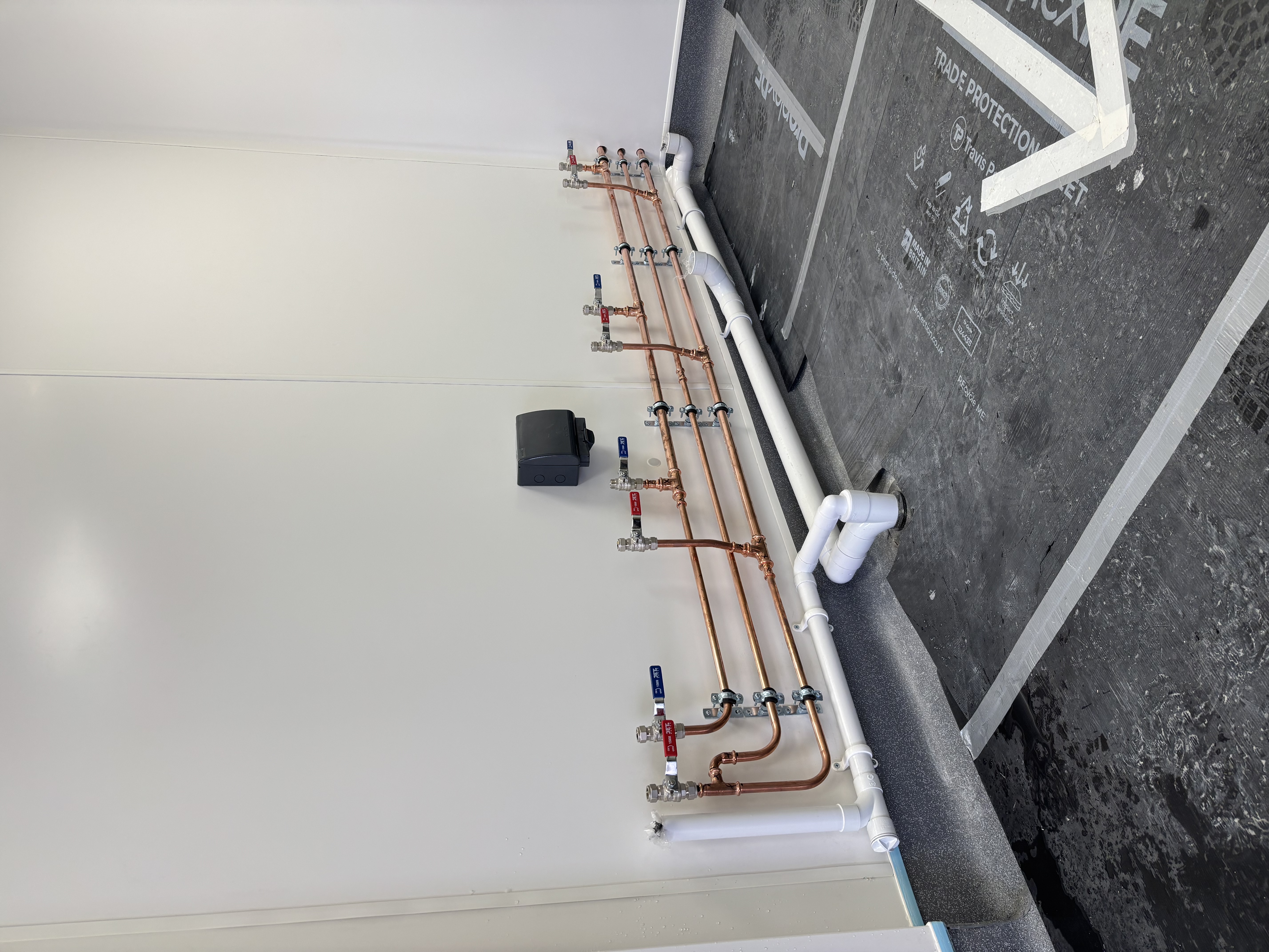 Copper hot, cold and return distribution pipework at Burger King Poole